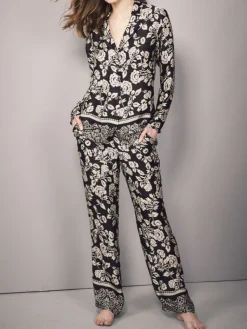 Lounge-Wear|Seidenpyjama^Eva B. Bitzer 100% Seide Pyjama FLOWER schwarz gold von schwarz mit gold-beigem Blumen Druck